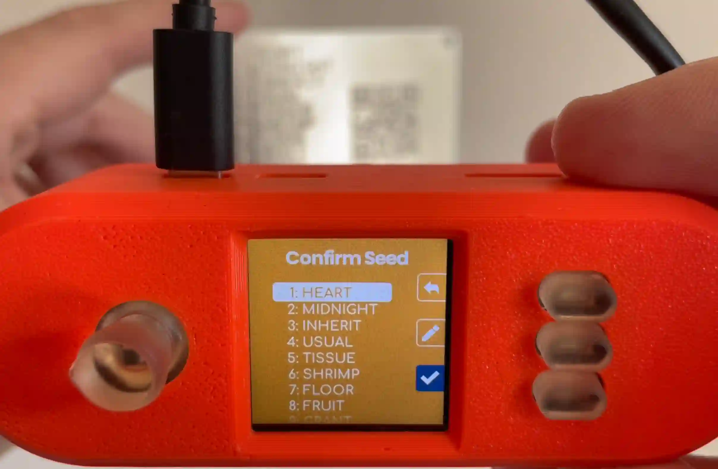 SeedHammer app scanning a CompactSeedQR from a SeedHammer backup plate