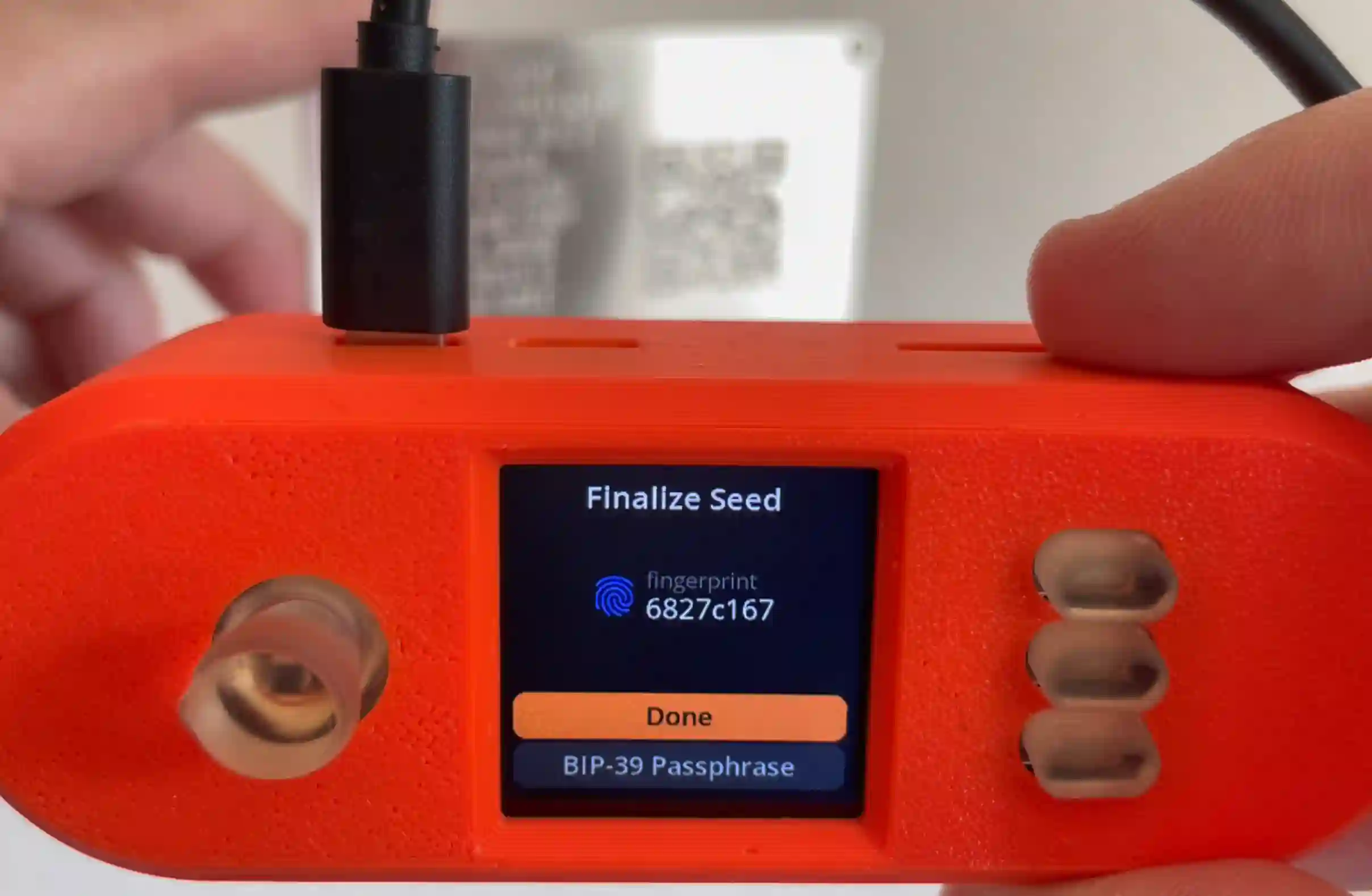 SeedSigner scanning a CompactSeedQR from a SeedHammer backup plate